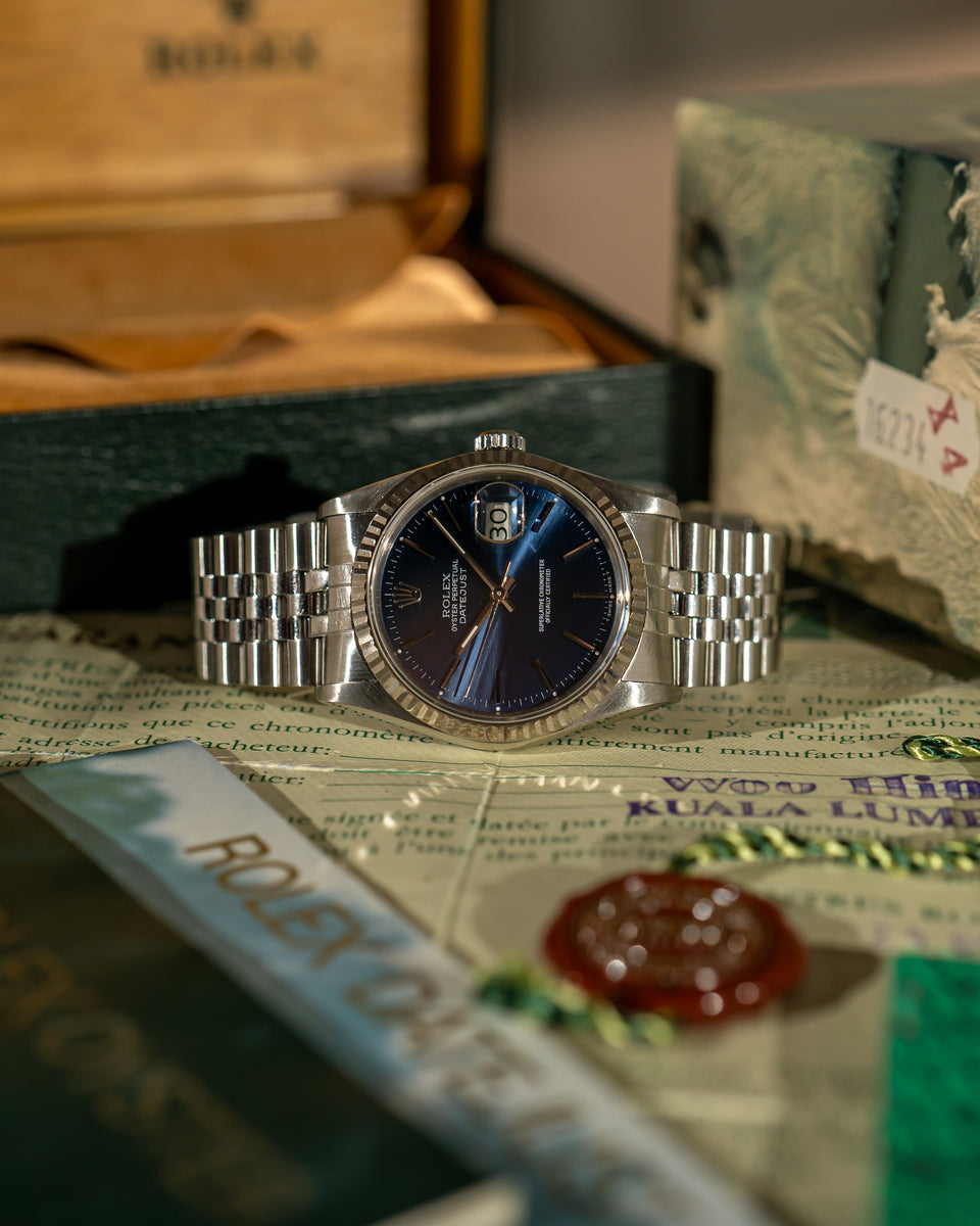 Datejust 16234 - Blue Dial - Box & Papers (1989) – Stories of time