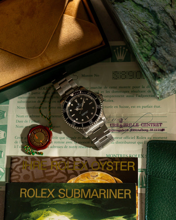 Rolex Submariner 14060 - Box & Papers 1994