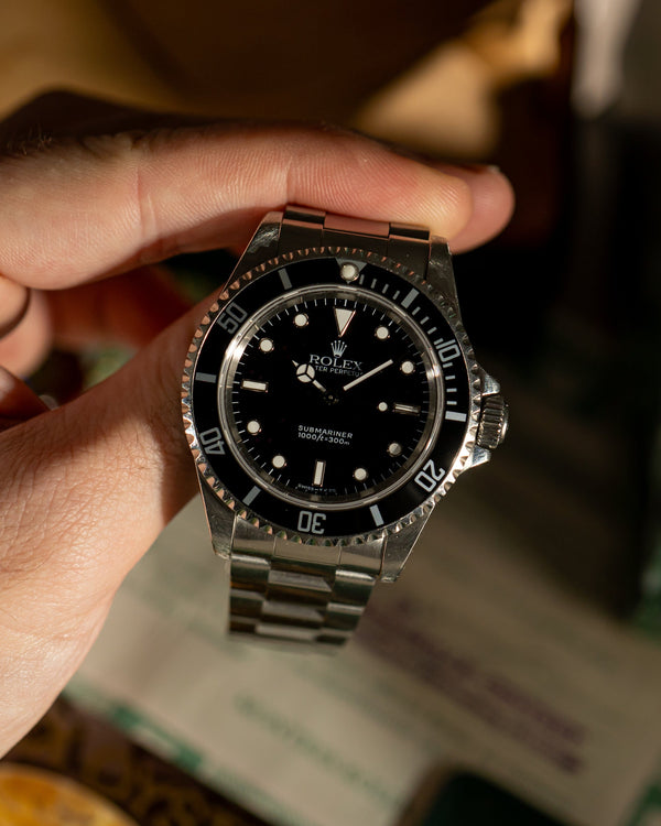 Rolex Submariner 14060 - Box & Papers 1994