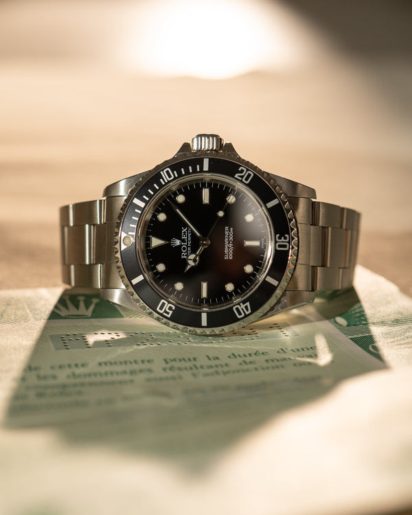 Rolex Submariner 14060 – With Papers (2000)
