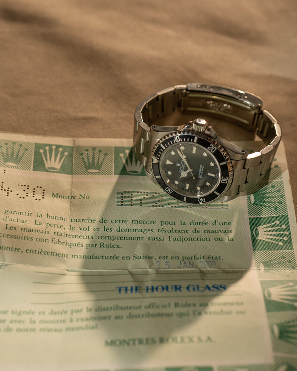 Rolex Submariner 14060 – With Papers (2000)