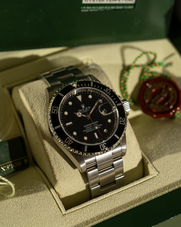 Rolex Submariner Date 16610 – NOS with Stickers – Full Set (2010)