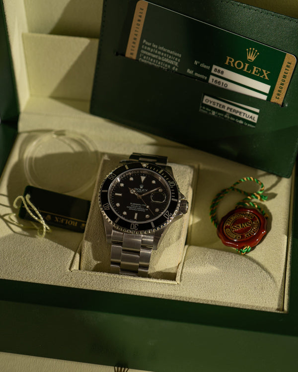 Rolex Submariner Date 16610 – NOS with Stickers – Full Set (2010)